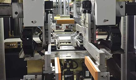 pre-stack magazine feeder with chipboard sheets entering production line